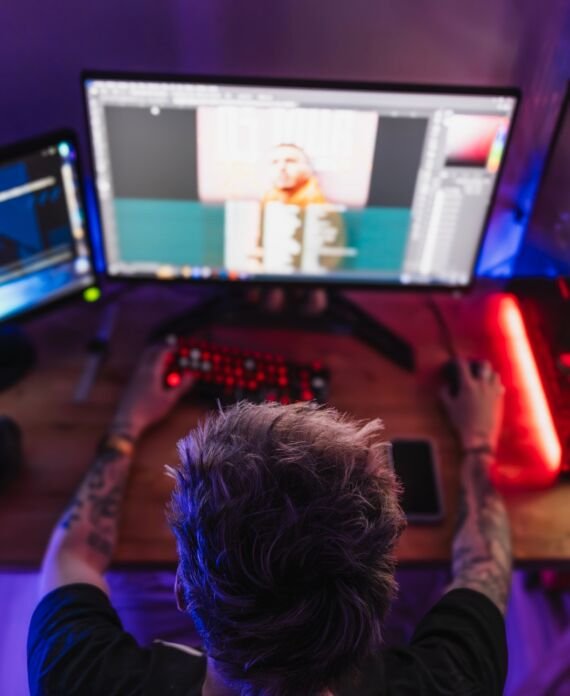 Overhead shot of a graphic designer working with his setup at home